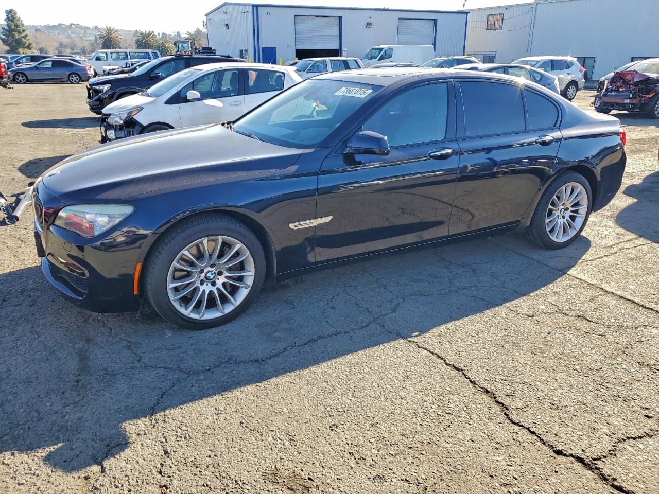 2011 BMW 7 Series 750i, VIN WBAKA8C5XBCY36599 — Minor dents and scratches