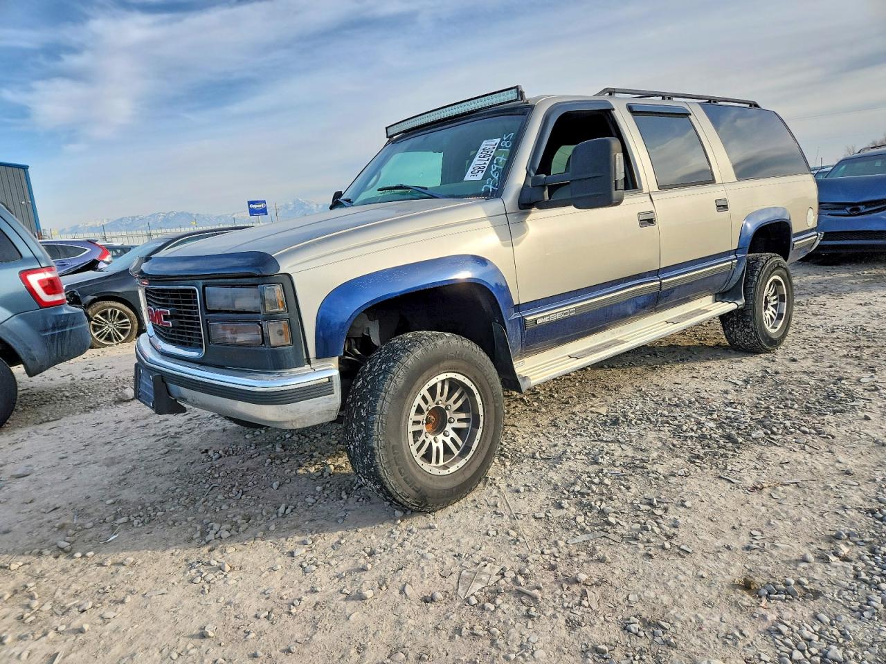1998 GMC Suburban, VIN 1GKGK26J8WJ722988 — Minor dents and scratches