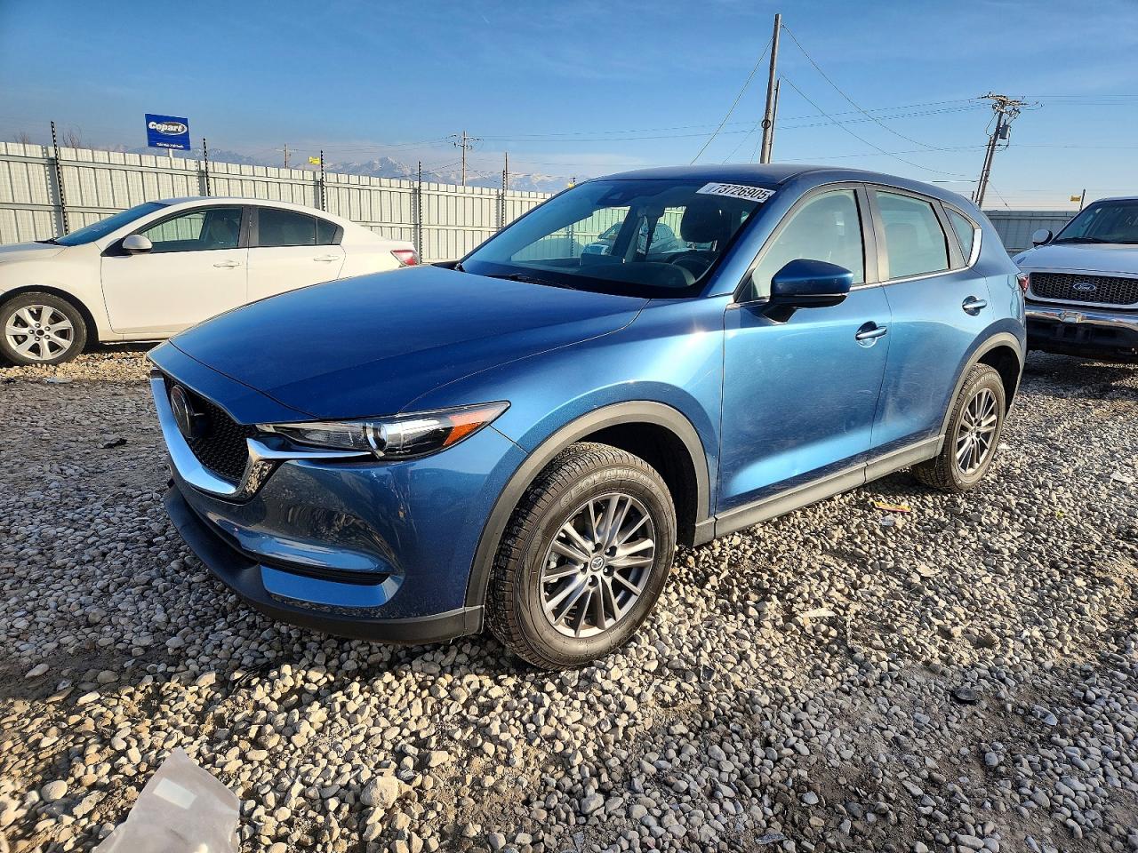 2021 Mazda CX-5 Sport, VIN JM3KFBBM8M0310400 — Rear end