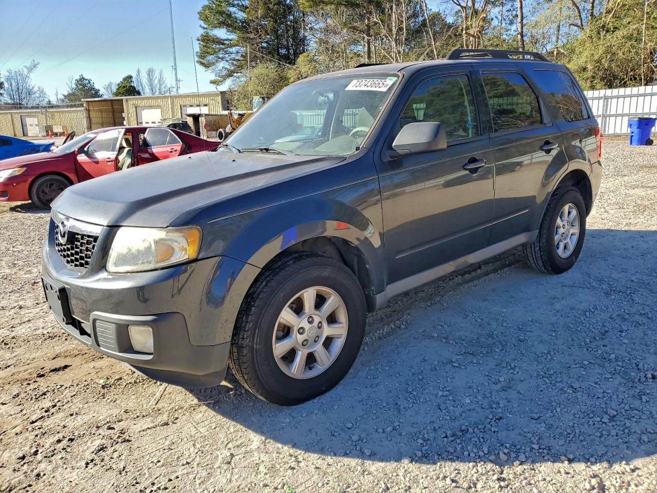 2010 Mazda Tribute Sport, VIN 4F2CY0C7XAKM02760 — Мелкие вмятины и царапины