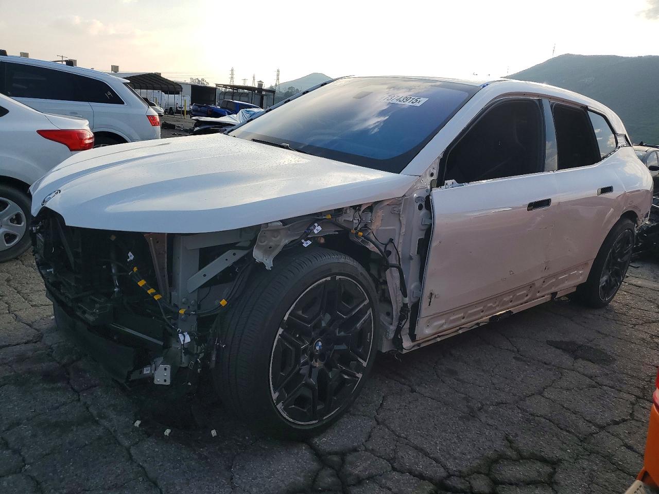 2026 BMW iX xDrive45, VIN WB543CF04TCW04831 — Front end