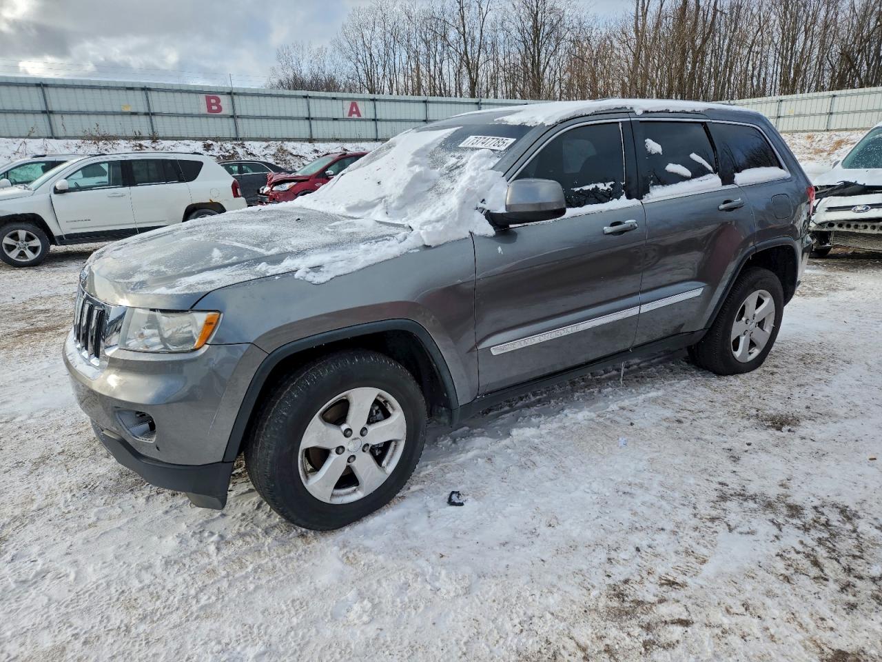2013 Jeep Grand Cherokee Laredo, VIN 1C4RJFAG9DC502447 — Rear end