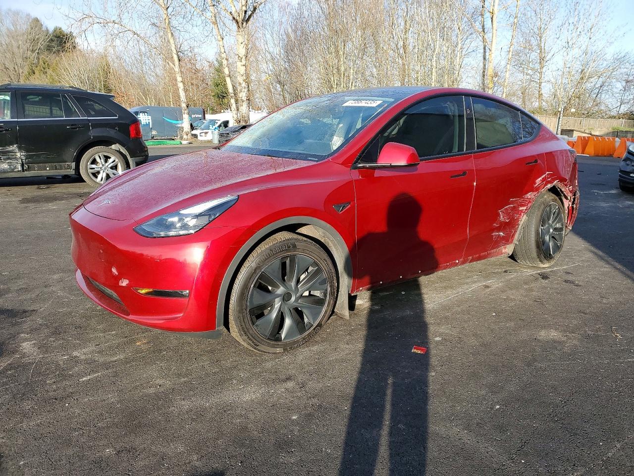 2024 Tesla Model Y Long Range, VIN 7SAYGDEE7RF169475 — Side