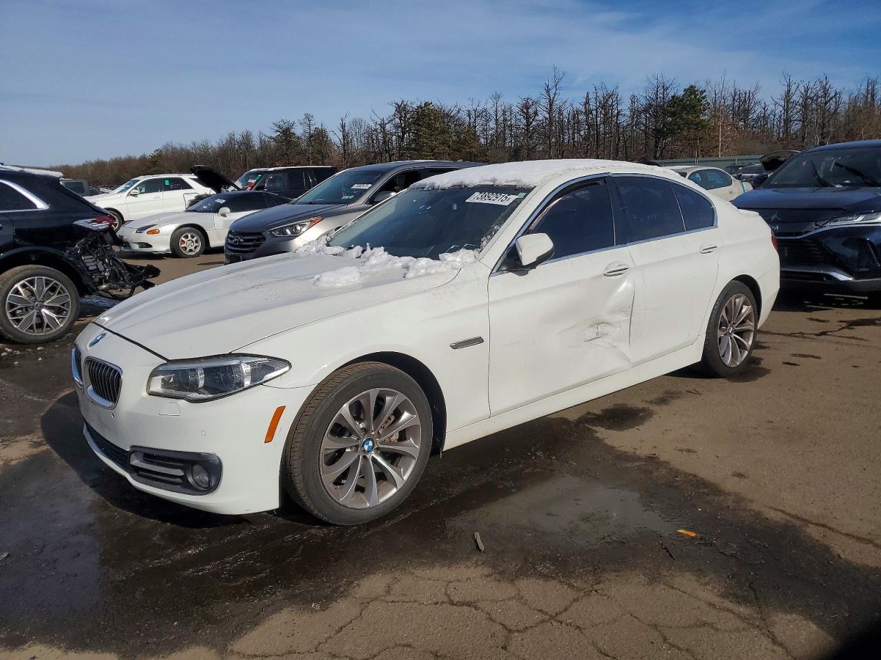 2016 BMW 5 Series 528i xDrive, VIN WBA5A7C51GG144898 — Side