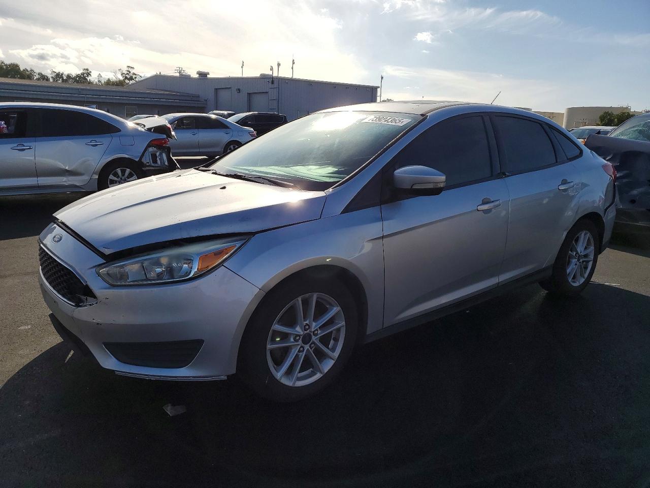 2015 Ford Focus SE, VIN 1FADP3F28FL307646 — Front end