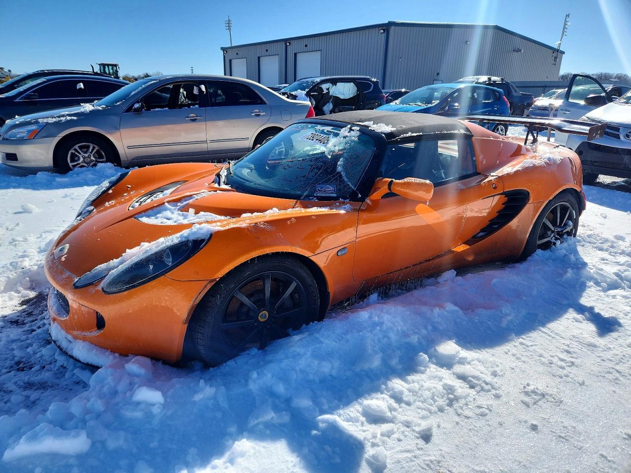 2007 Lotus Elise, VIN SCCPC11197HL30006 — Зад