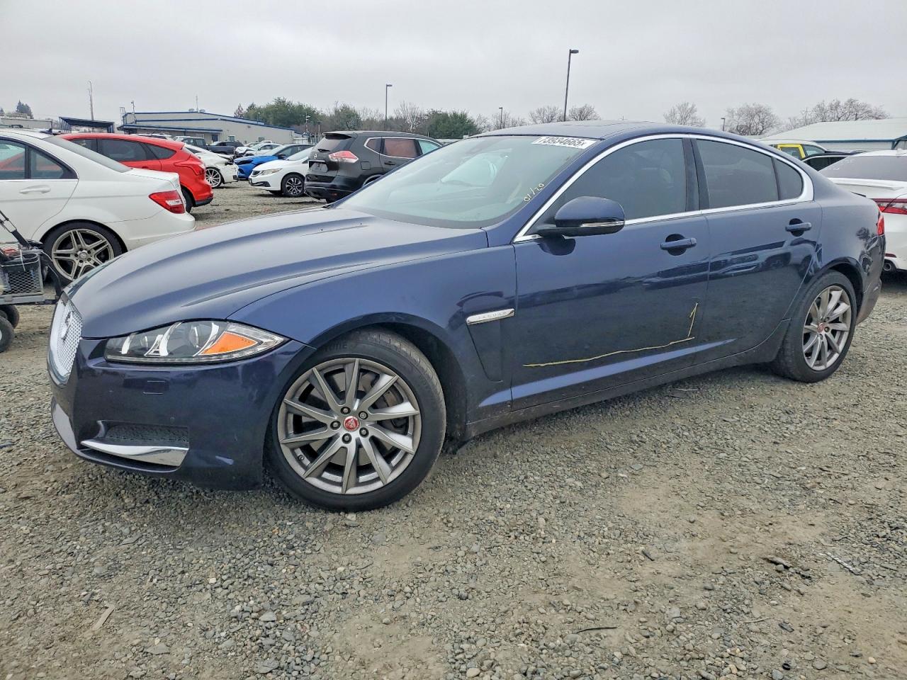 2015 Jaguar XF T Premium, VIN SAJWA0FS1FPU74069 — Water / flood