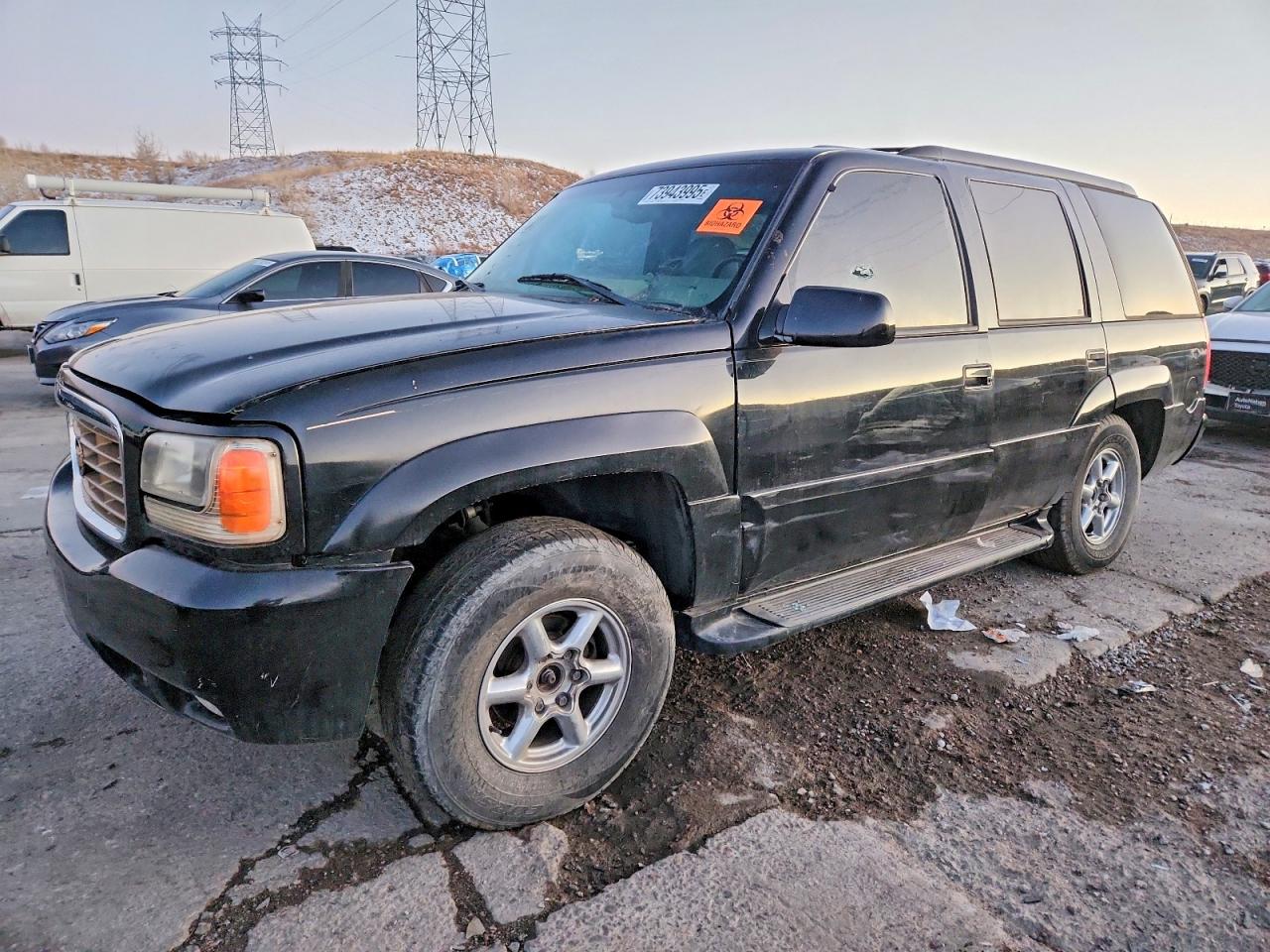 1999 Cadillac Escalade, VIN 1GYEK13R6XR411578 — Vandalism