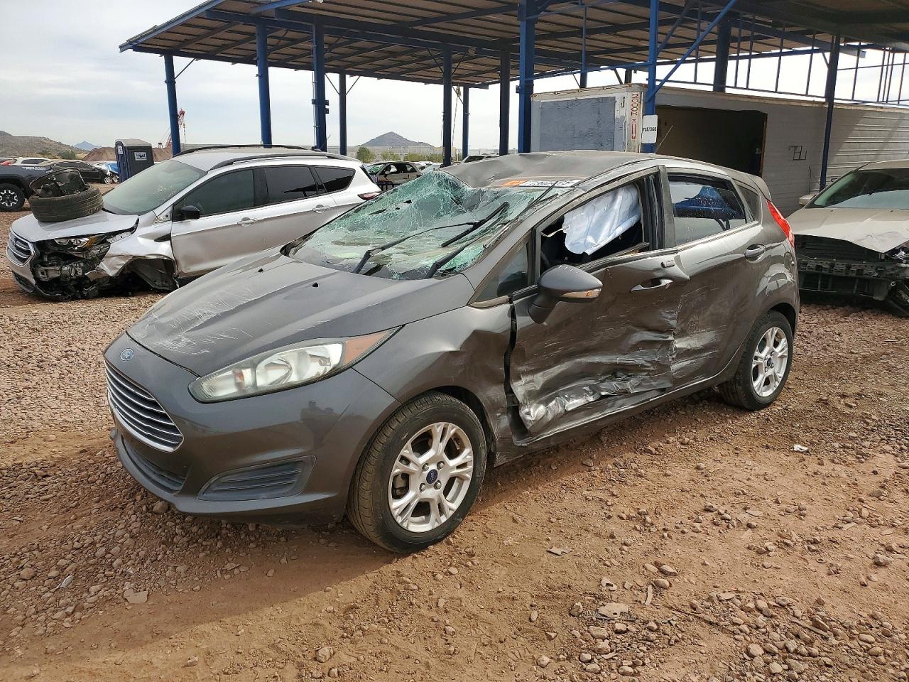 2015 Ford Fiesta SE, VIN 3FADP4EJ9FM213658 — Rollover