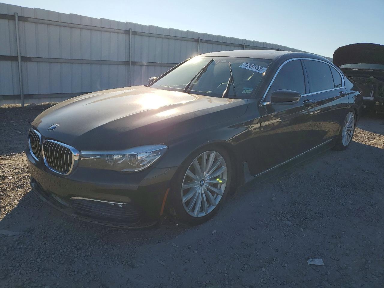 2016 BMW 7 Series 740i, VIN WBA7E2C52GG548096 — Minor dents and scratches