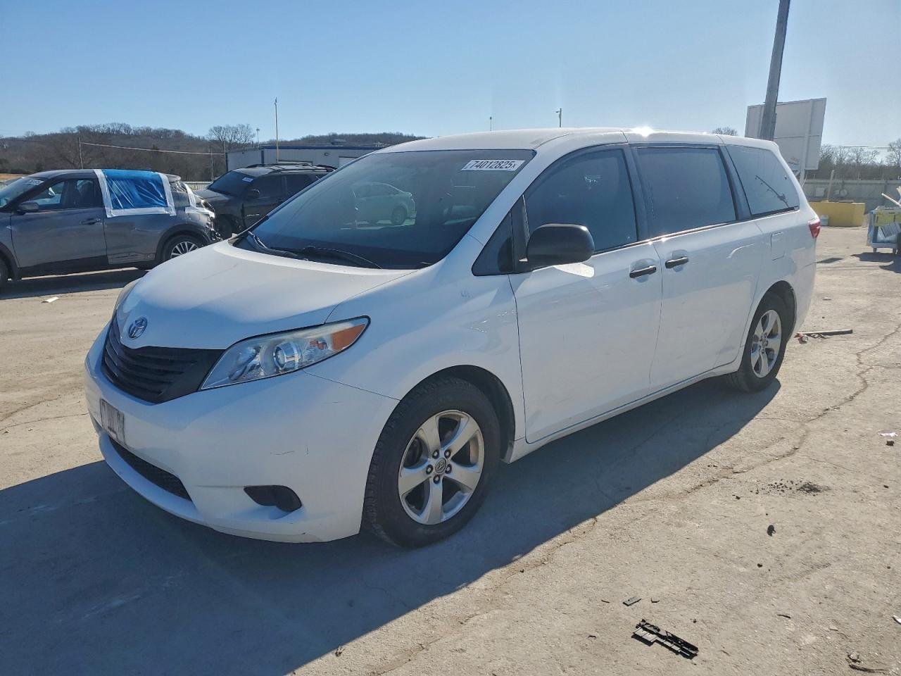 2017 Toyota Sienna L, VIN 5TDZZ3DC2HS858453 — Side