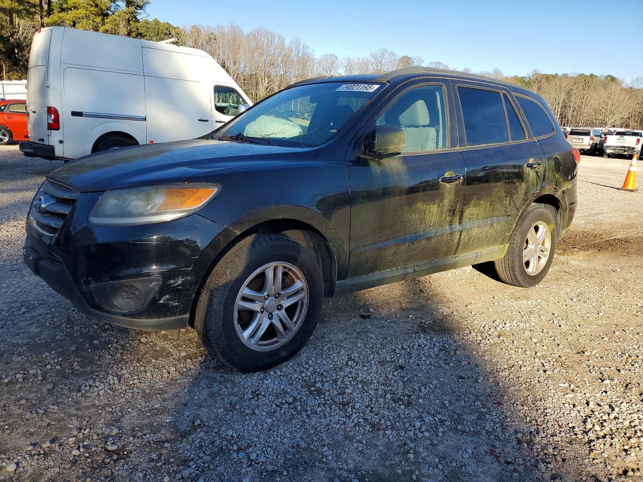 2012 Hyundai Santa Fe GLS, VIN 5XYZGDAB2CG148997 — Minor dents and scratches
