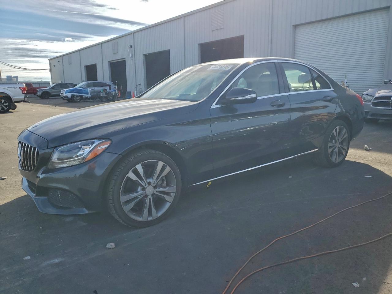 2015 Mercedes-Benz C 300, VIN 55SWF4KB4FU032554 — Front end
