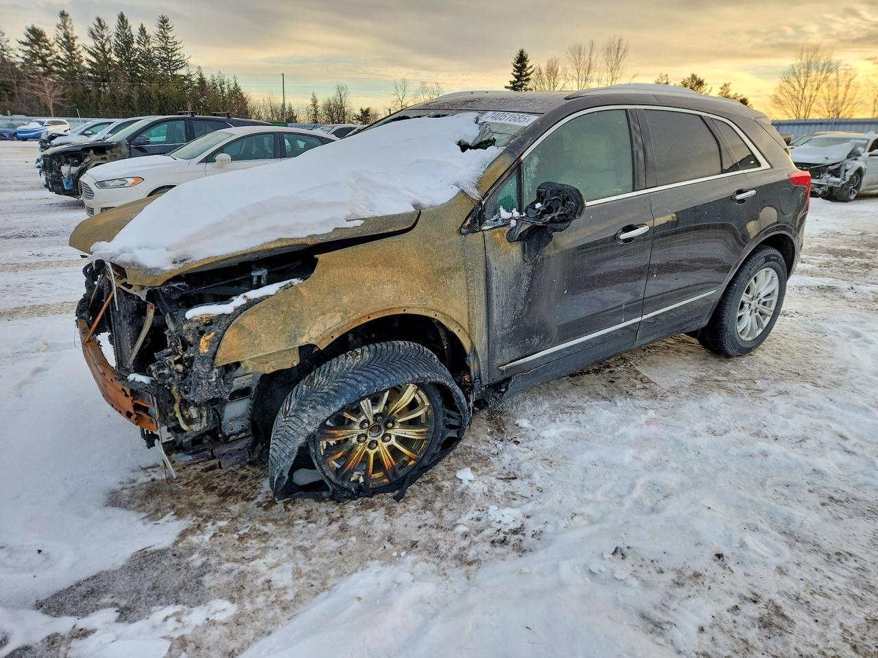 2017 Cadillac XT5 FWD, VIN 1GYKNARS1HZ223735 — Vandalism