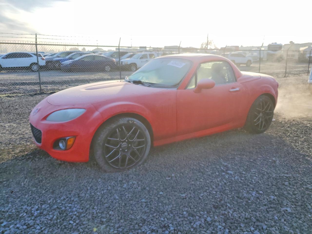 2009 Mazda MX-5 Miata Grand Touring, VIN JM1NC26F390201912 — Side