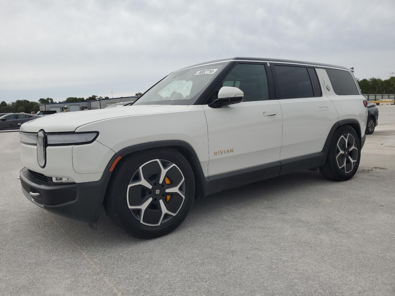 2023 Rivian R1S Adventure, VIN 7PDSGABA3PN024458 — Water / flood