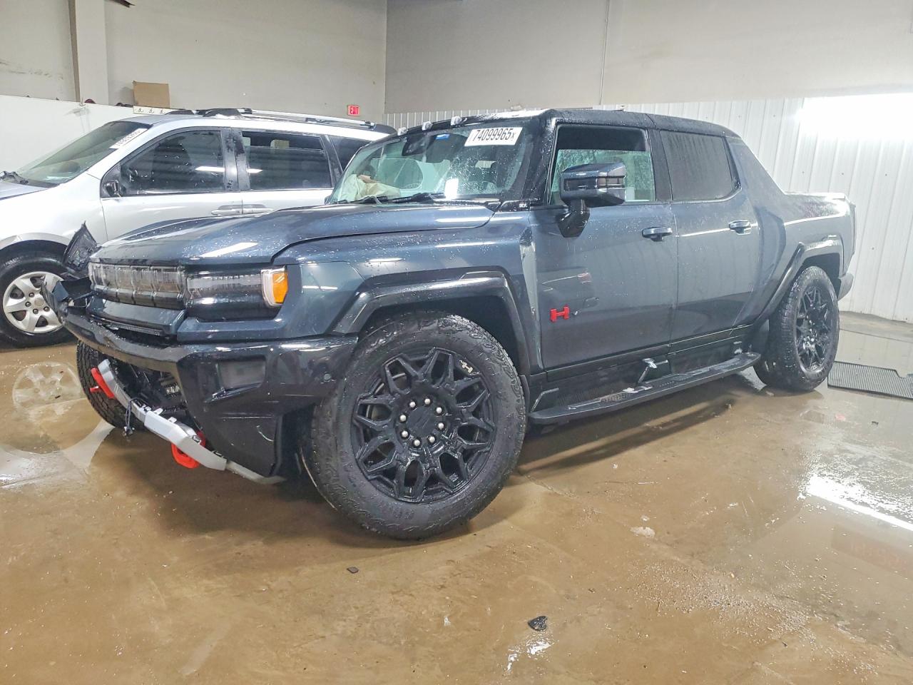 2025 GMC HUMMER EV Pickup 2X, VIN 1GT40BDD0SU113873 — Rear end