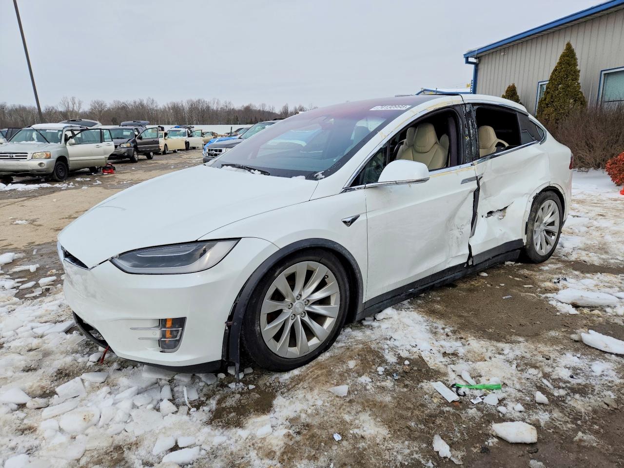 2019 Tesla Model X 75D, VIN 5YJXCDE24KF189893 — Side