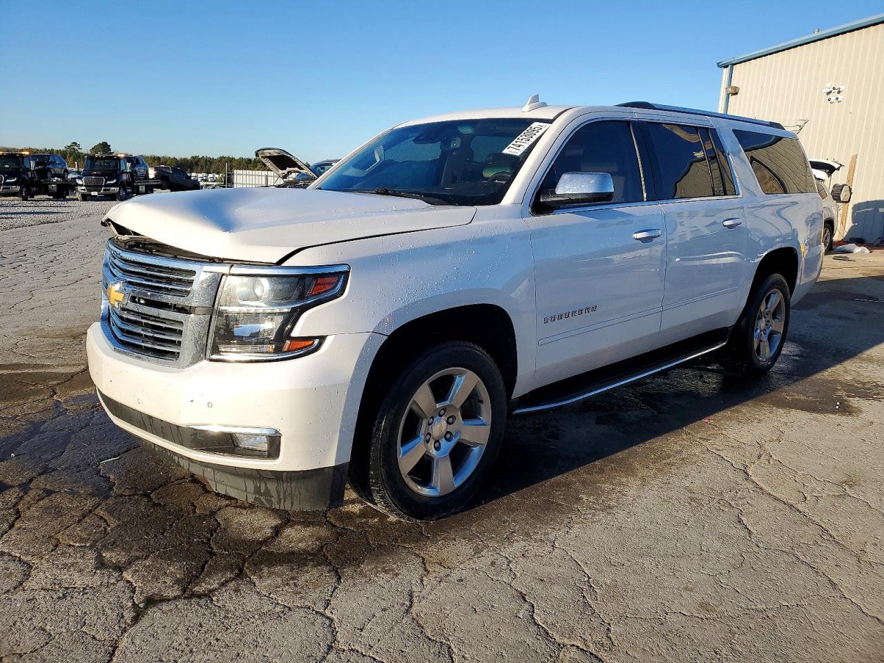 2018 Chevrolet Suburban Premier, VIN 1GNSCJKC7JR217336 — Side