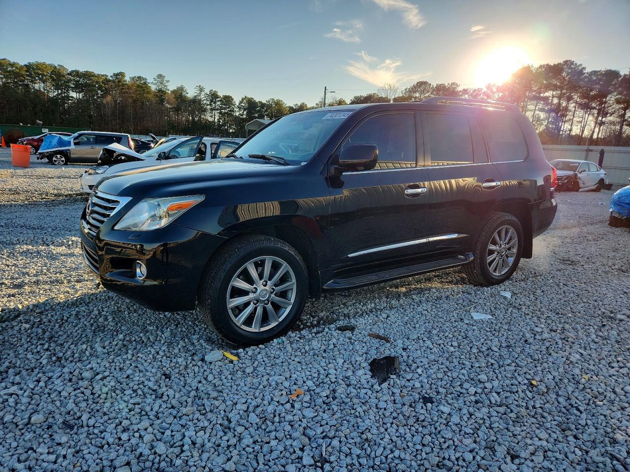2011 Lexus LX 570, VIN JTJHY7AX3B4062825 — Front end
