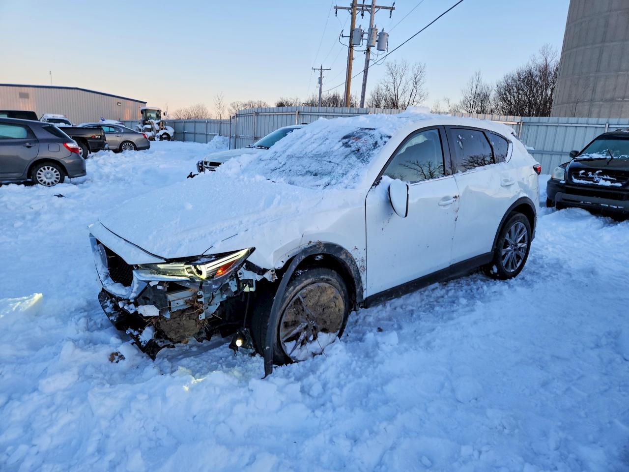 2021 Mazda CX-5 Grand Touring, VIN JM3KFBDM9M0476003 — Front end