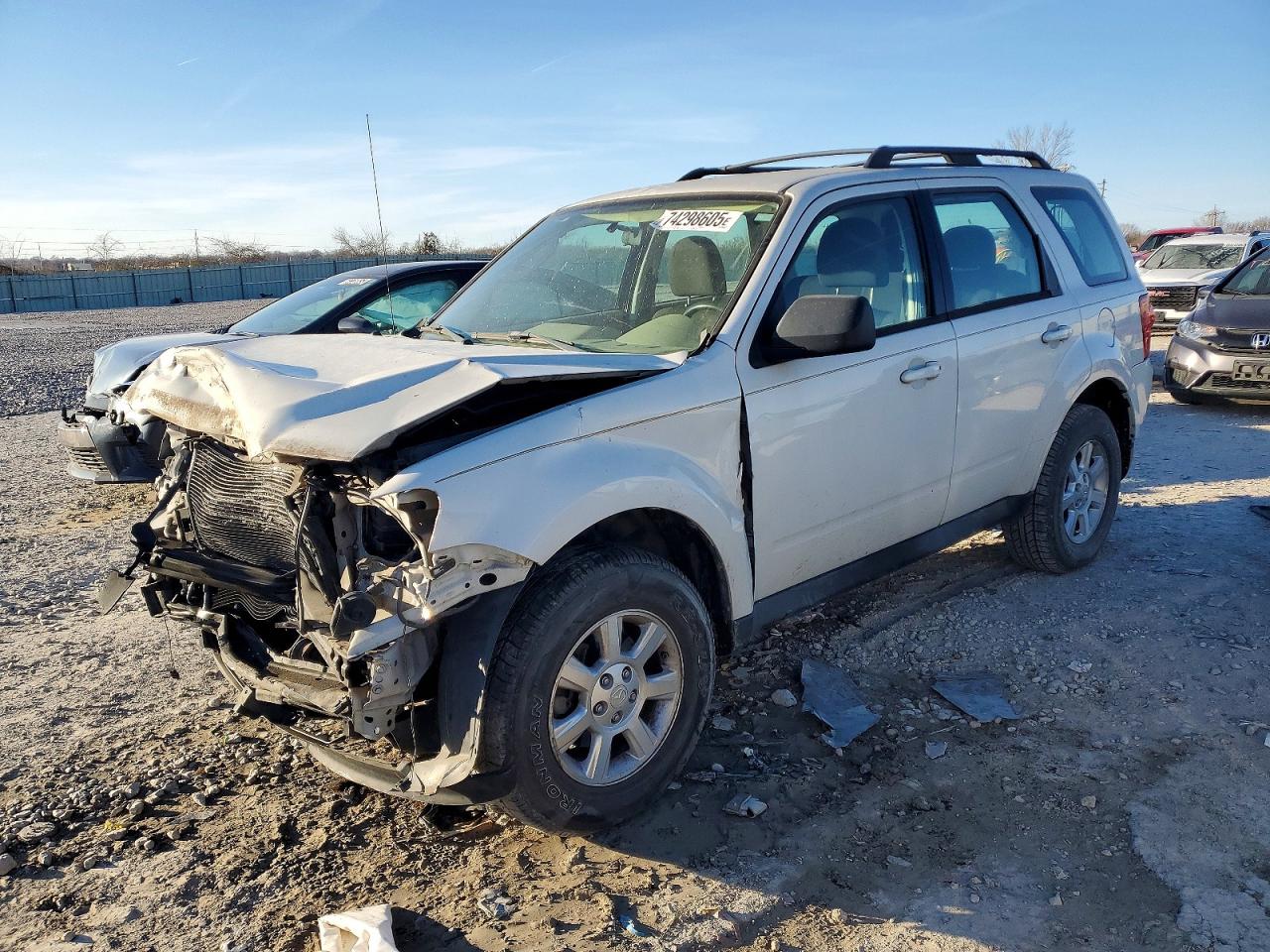 2009 Mazda Tribute Sport, VIN 4F2CZ02799KM00749 — Перед