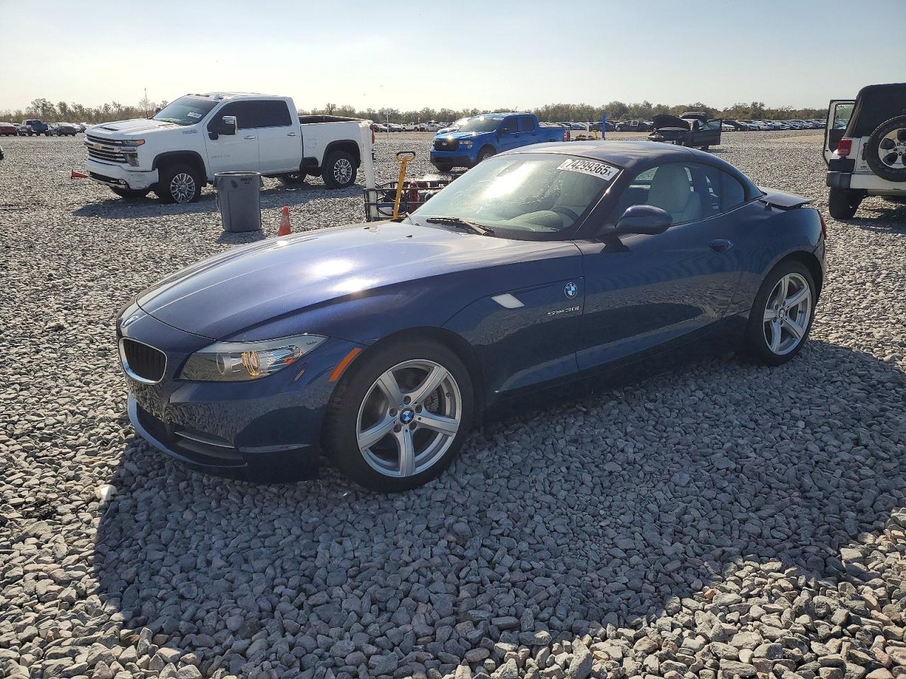 2011 BMW Z4 sDrive30i, VIN WBALM5C52BE378443 — Rear end