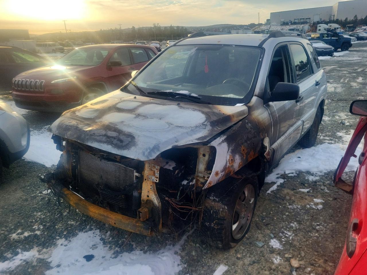2010 Kia Sportage LX, VIN KNDKGCA35A7713256 — Burn