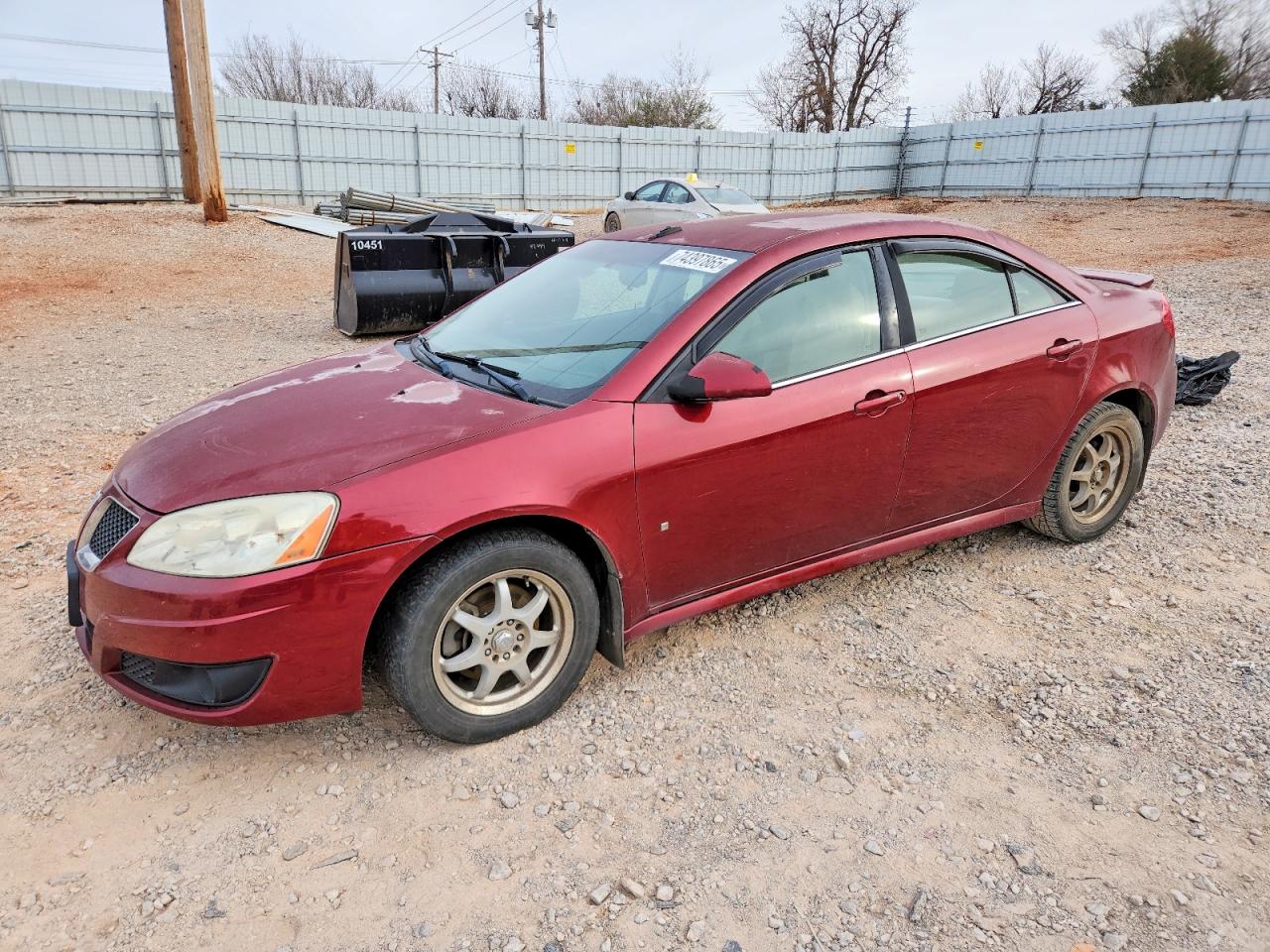 2009 Pontiac G6 1SB, VIN 1G2ZJ57KX94264703 — Град