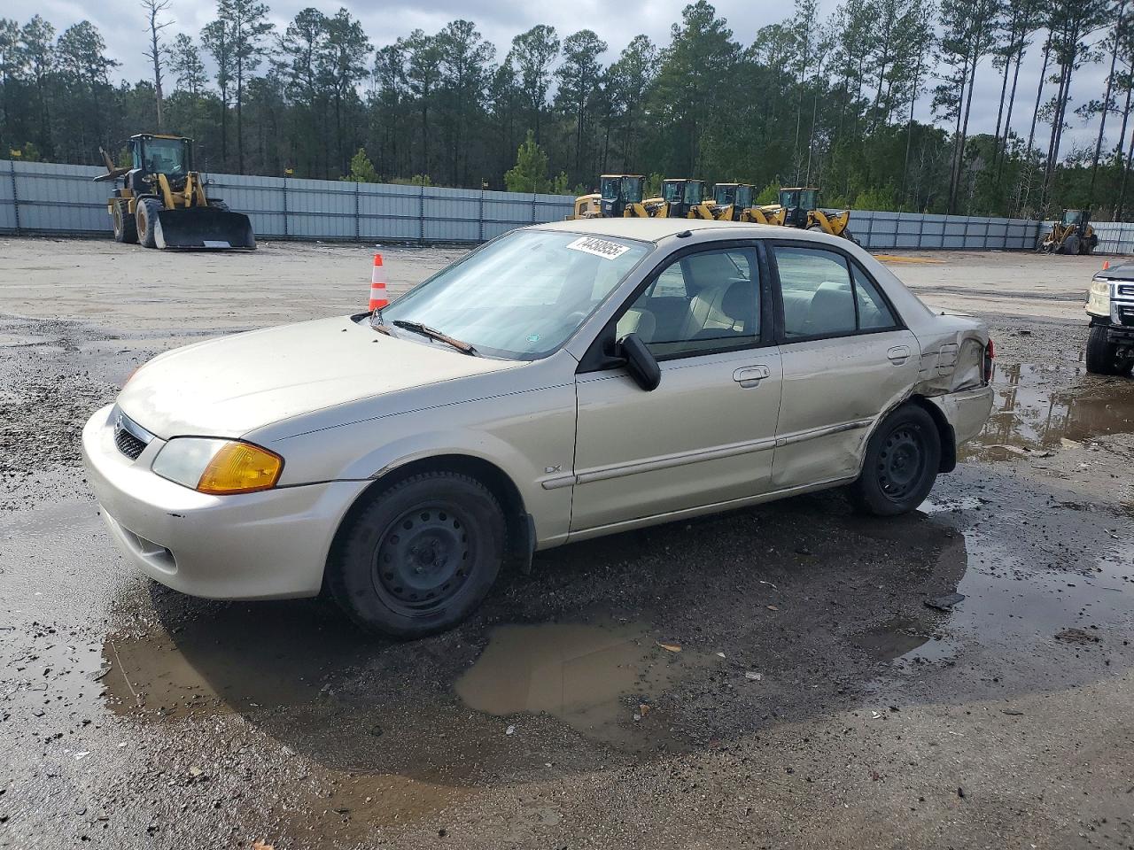 1999 Mazda Protege DX, VIN JM1BJ2223X0124029 — Бок