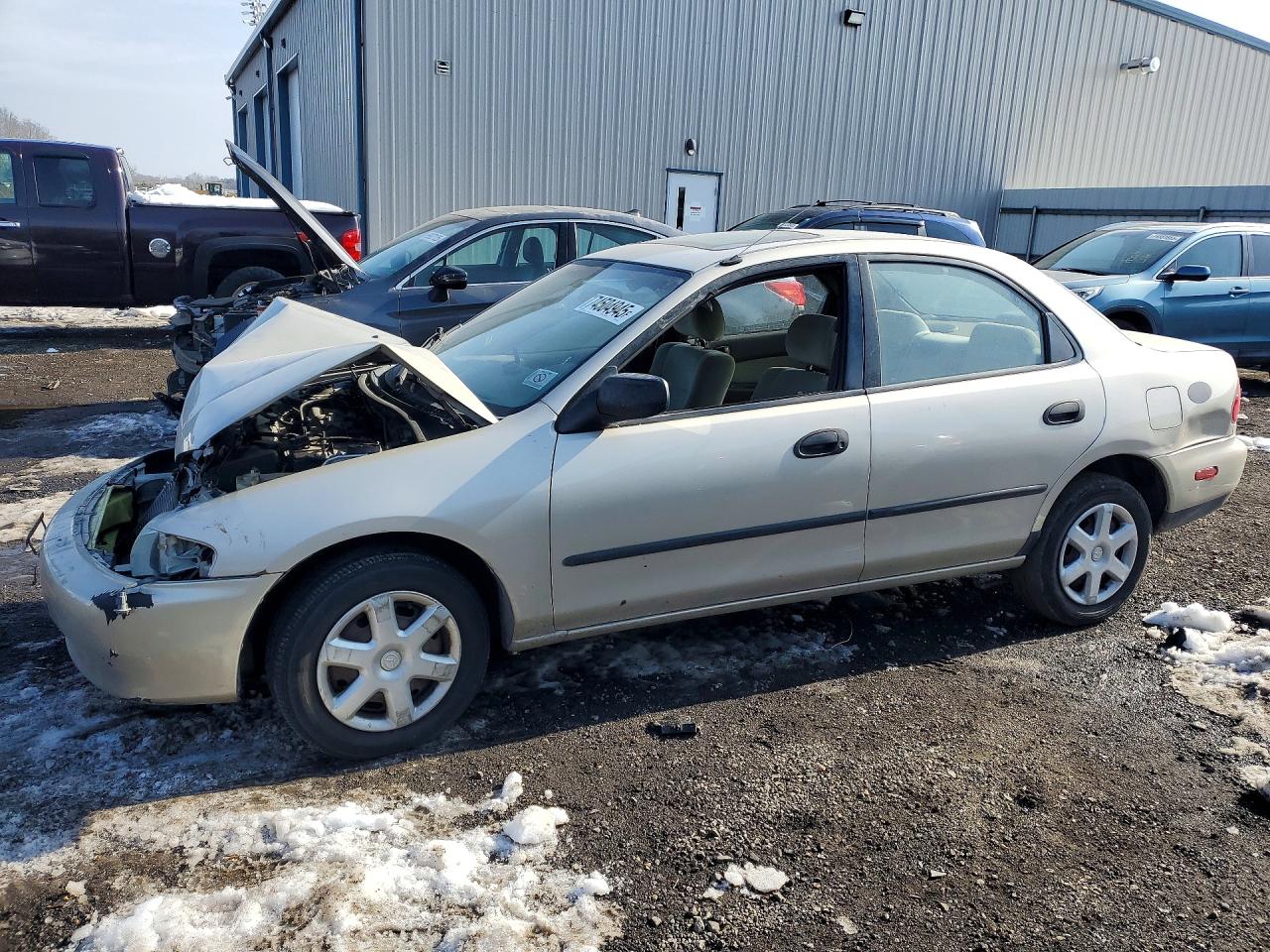 1998 Mazda Protege DX, VIN JM1BC1419W0218276 — Front end