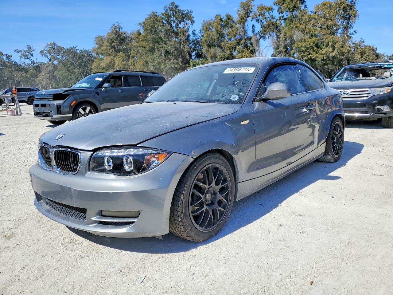 2011 BMW 1 Series 128i, VIN WBAUP7C57BVK78569 — Rear end
