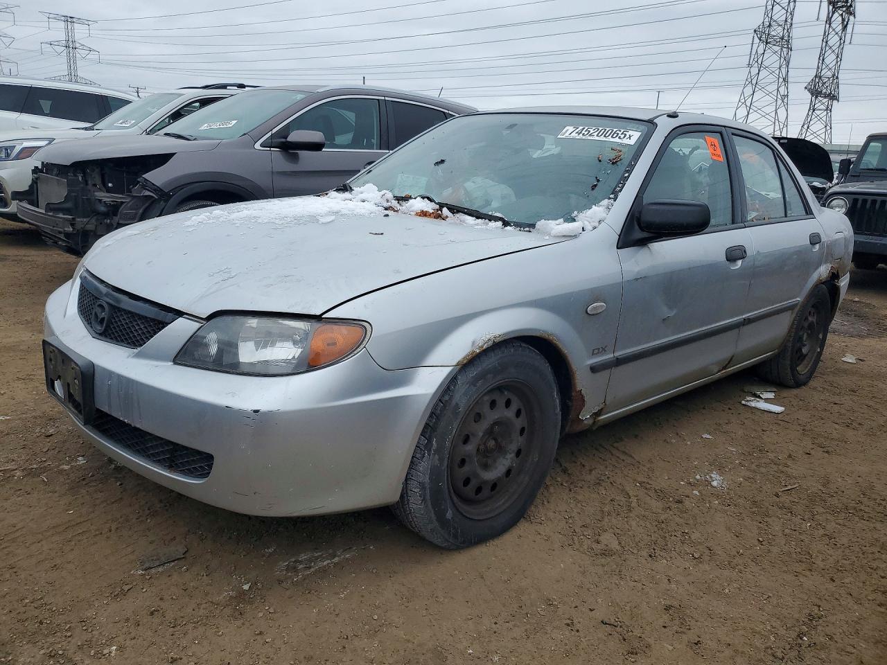 2003 Mazda Protege DX, VIN JM1BJ225730104693 — Мелкие вмятины и царапины