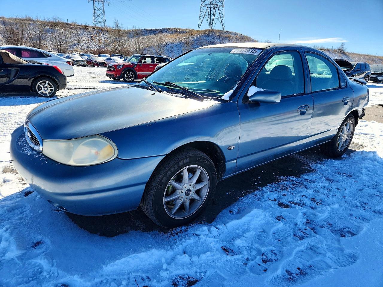 2000 Ford Contour SE Fleet, VIN 1FAFP66L0YK101555 — Front end
