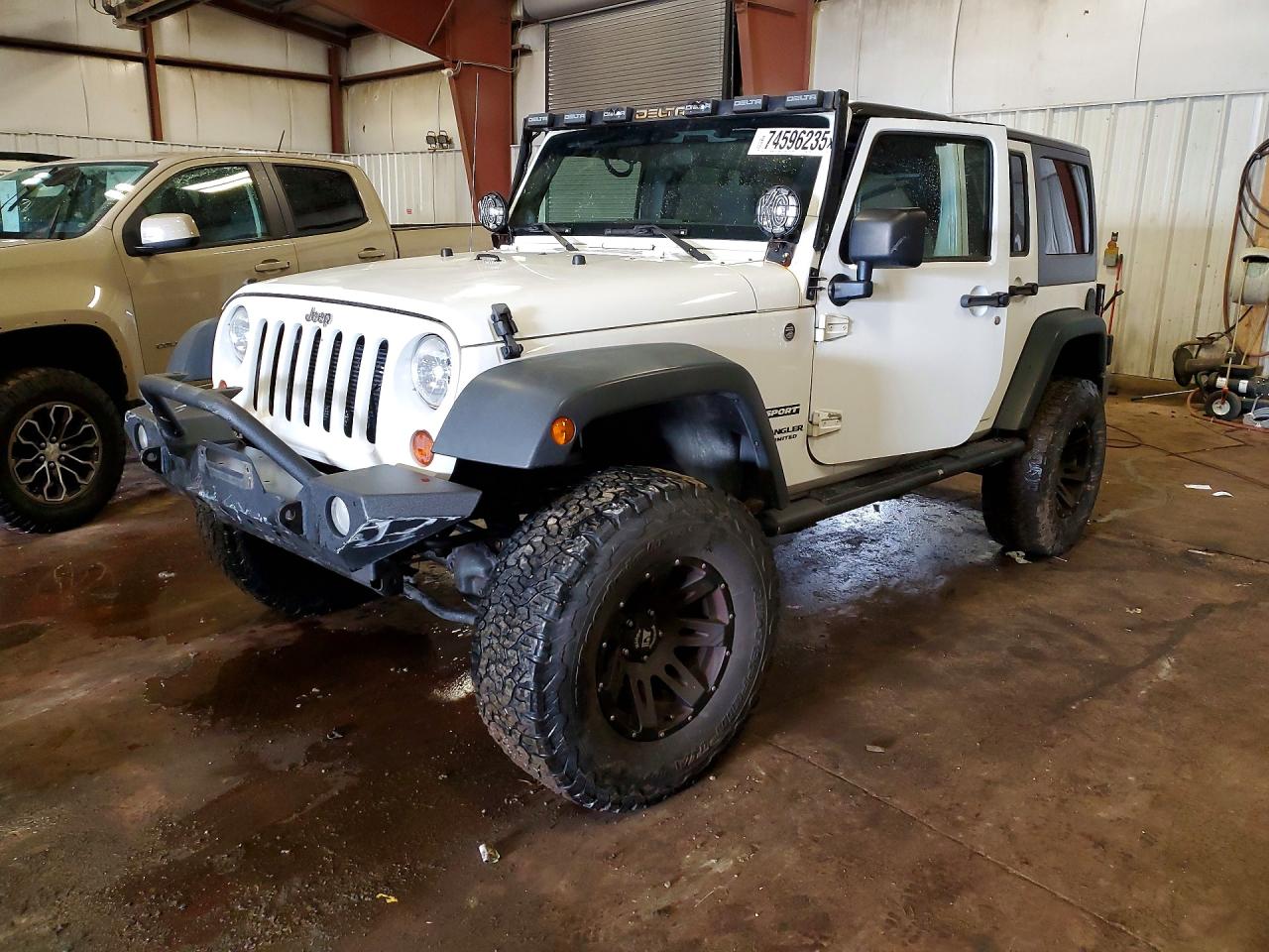 2012 Jeep Wrangler Unlimited Sport, VIN 1C4BJWDG2CL212935 — Frame damage
