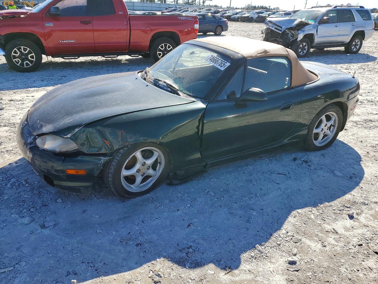 1999 Mazda MX-5 Miata, VIN JM1NB3539X0124962 — Side