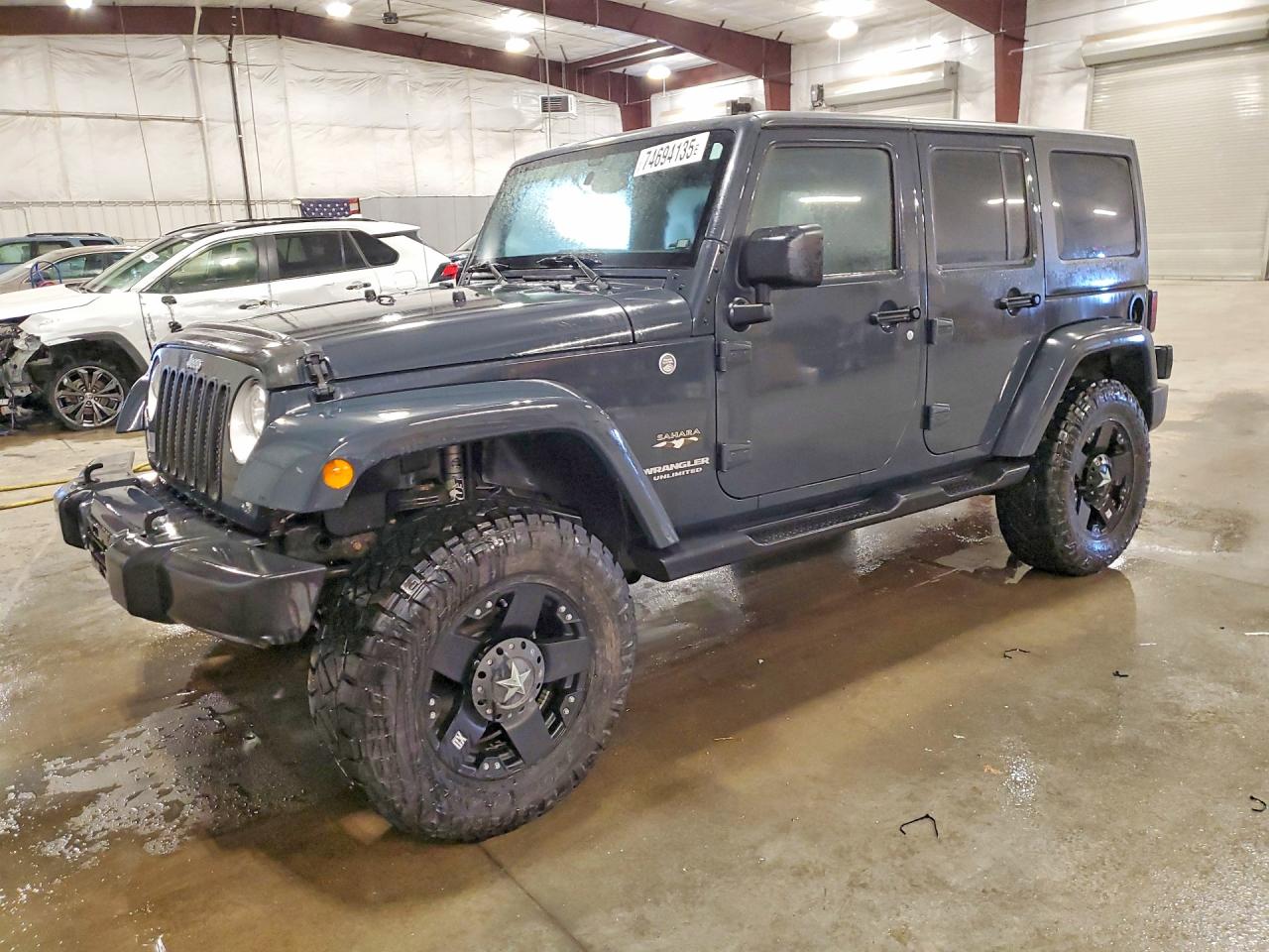 2017 Jeep Wrangler Unlimited Sahara, VIN 1C4BJWEGXHL532249 — Side