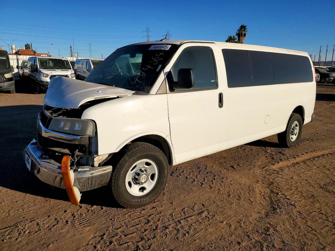 2015 Chevrolet Express Passenger LT, VIN 1GAZG1FGXF1167460 — Front end