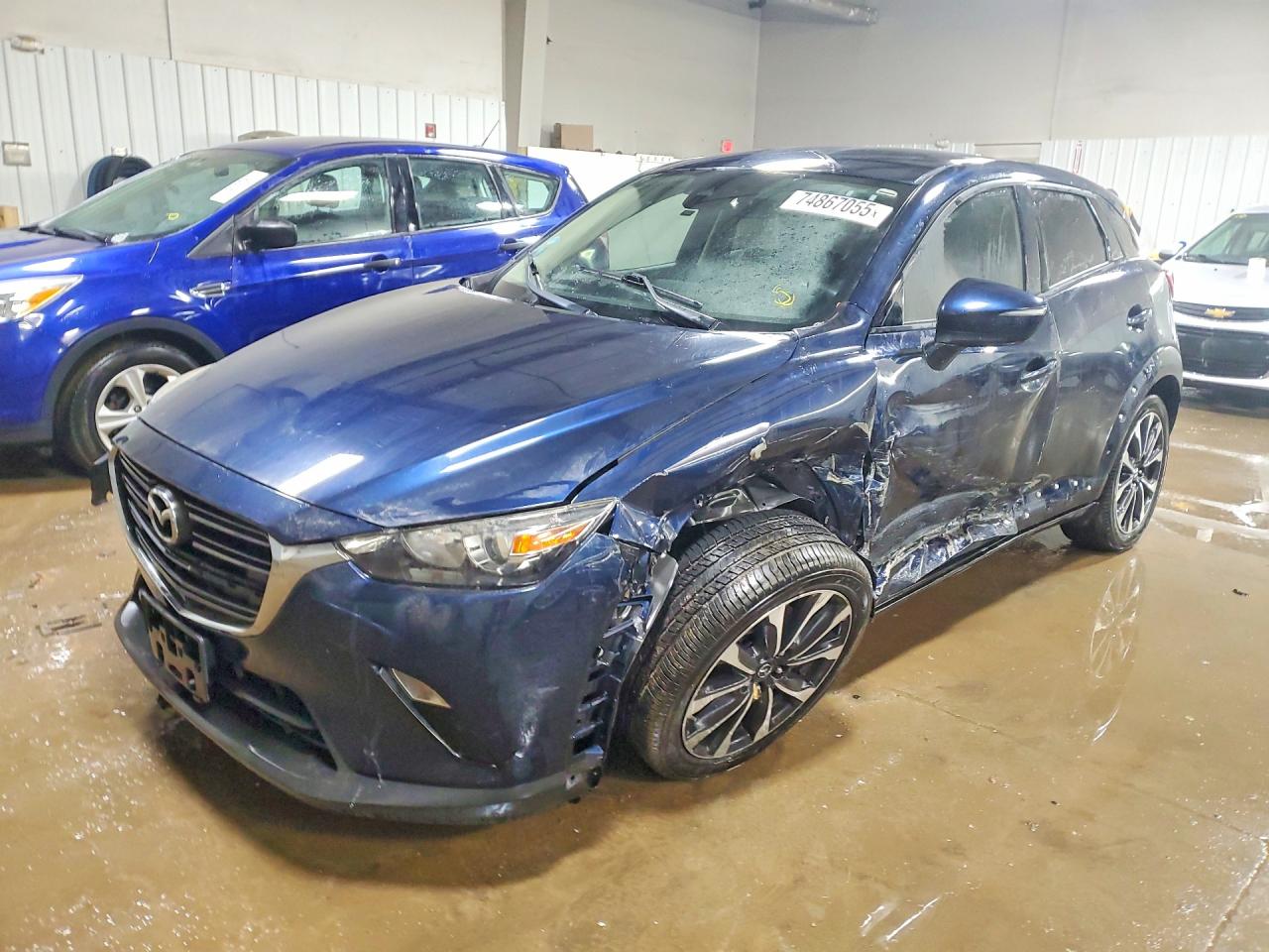 2019 Mazda CX-3 Touring, VIN JM1DKFC73K1421280 — Side