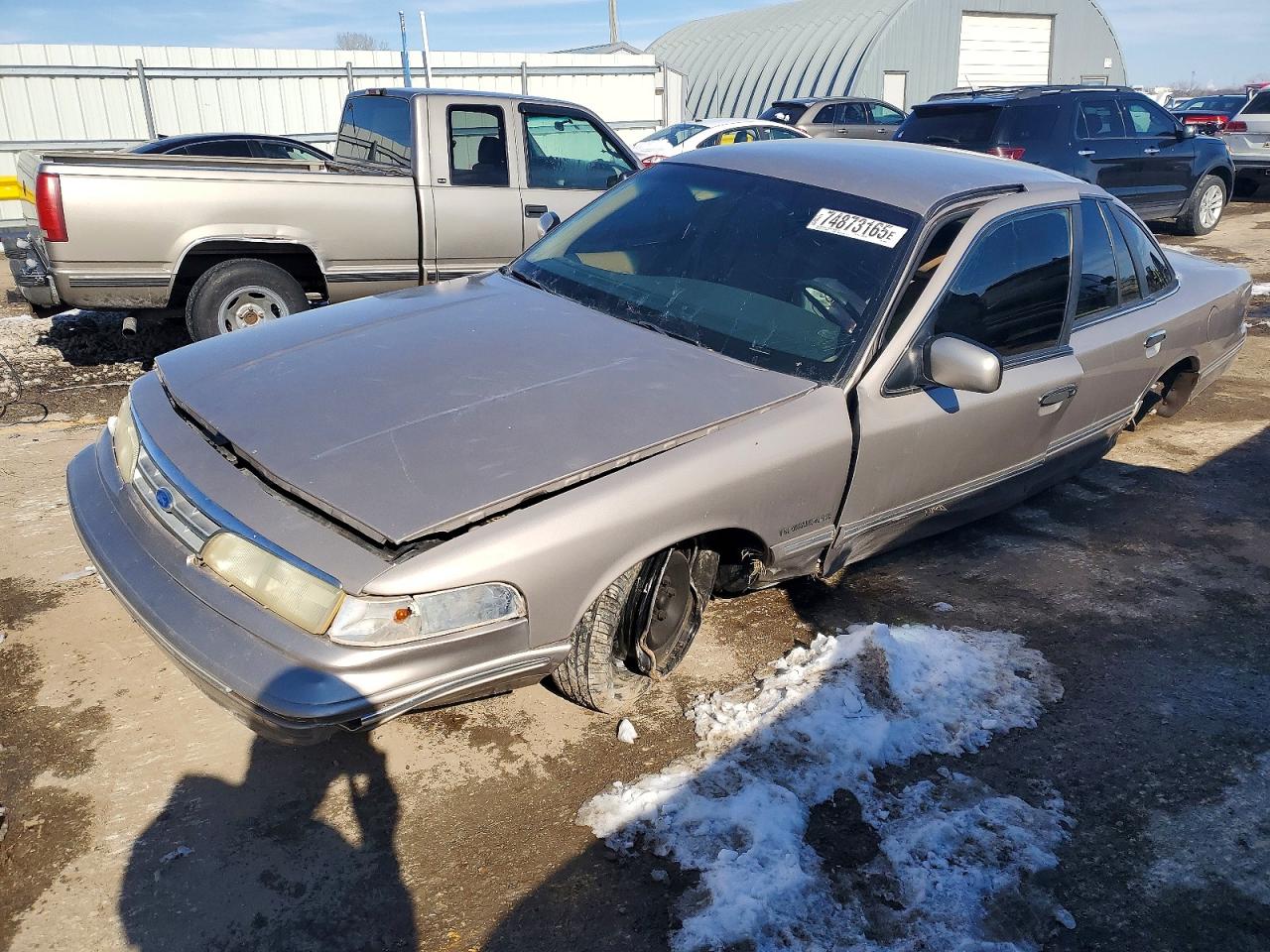 1995 Ford Crown Victoria, VIN 2FALP73W3SX150082 — Side