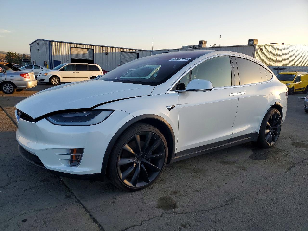 2019 Tesla Model X 75D, VIN 5YJXCBE24KF183032 — Side