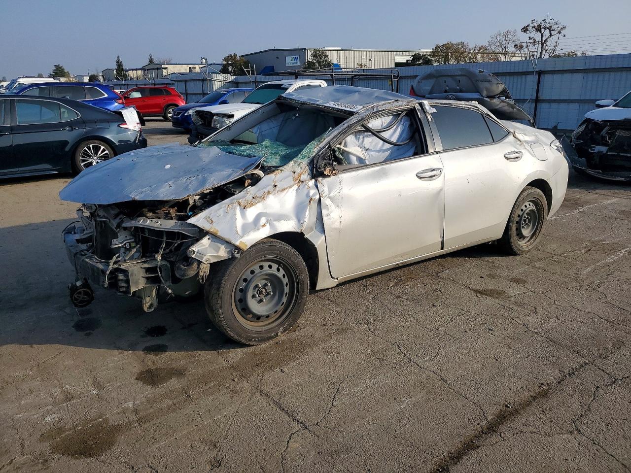 2019 Toyota Corolla LE, VIN 2T1BURHE1KC189865 — Rollover
