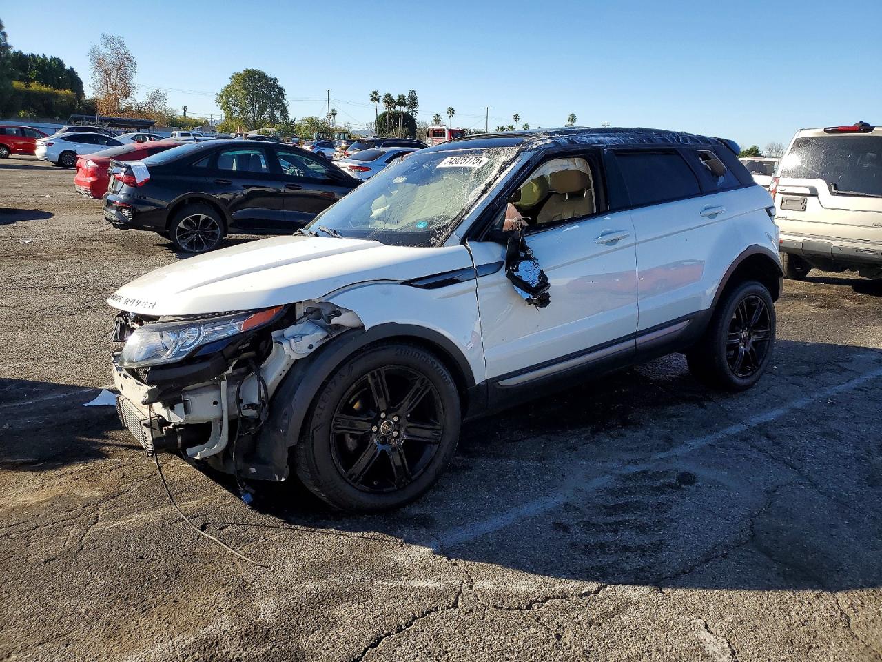 2015 Land Rover Range Rover Evoque Pure Premium, VIN SALVR2BG0FH983752 — Rollover