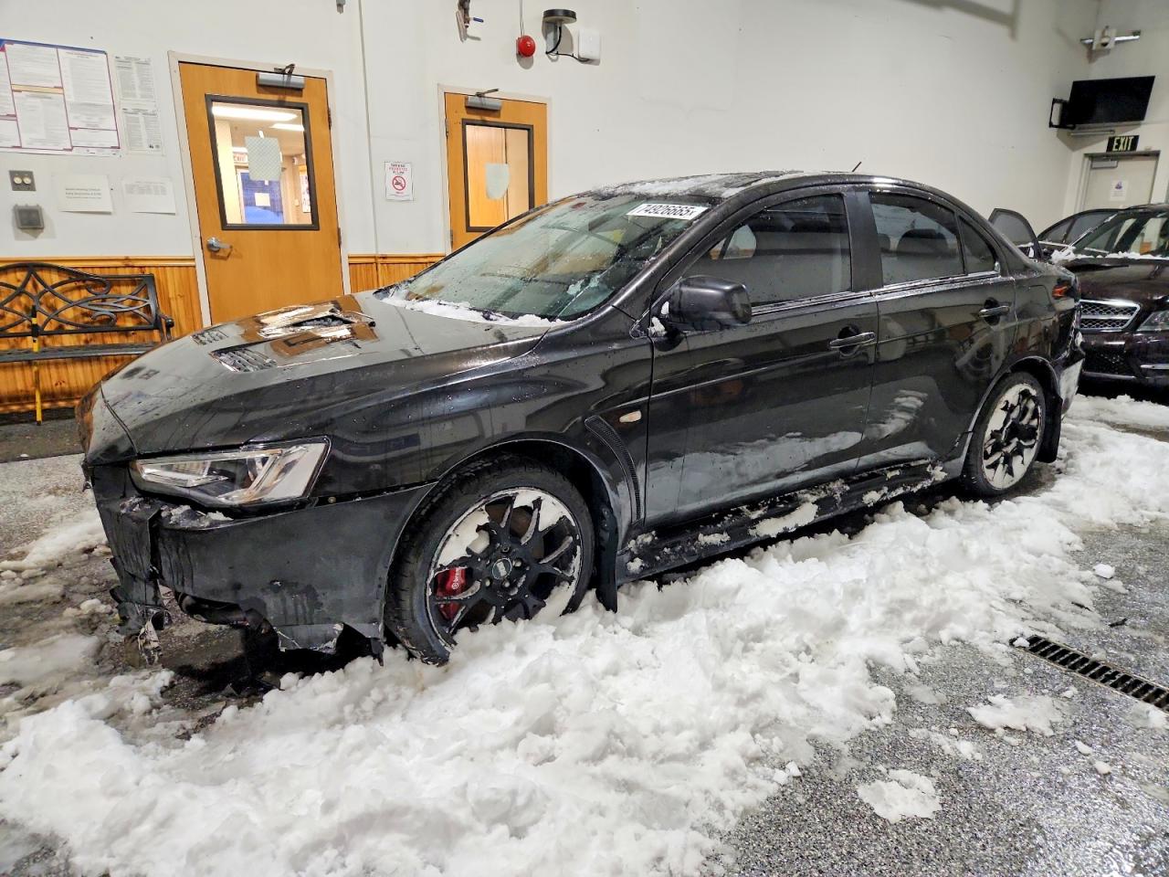 2013 Mitsubishi Lancer Evolution MR, VIN JA32W5FVXDU016629 — Front end