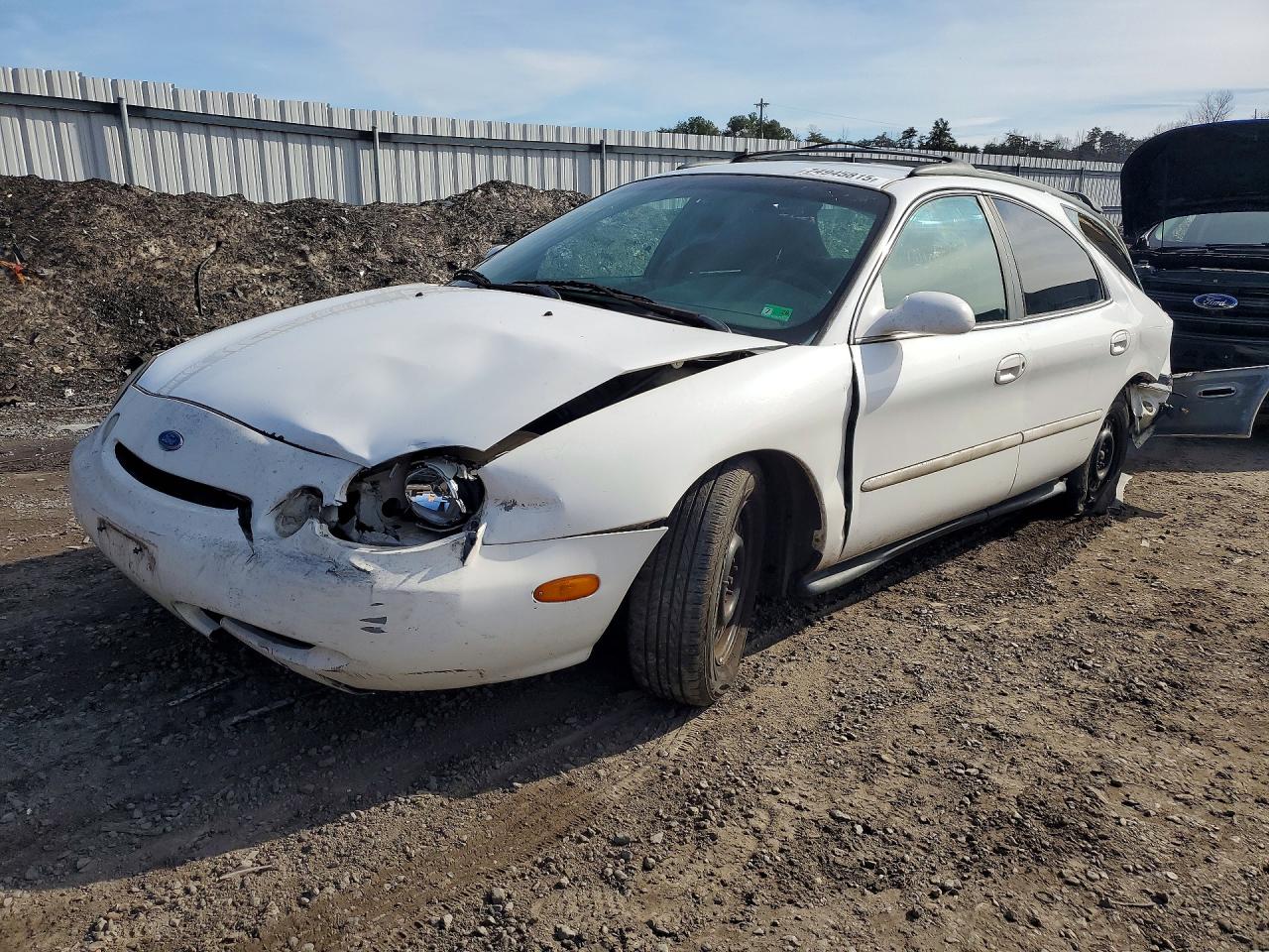 1997 Ford Taurus GL, VIN 1FALP57U0VA196205 — Rear end