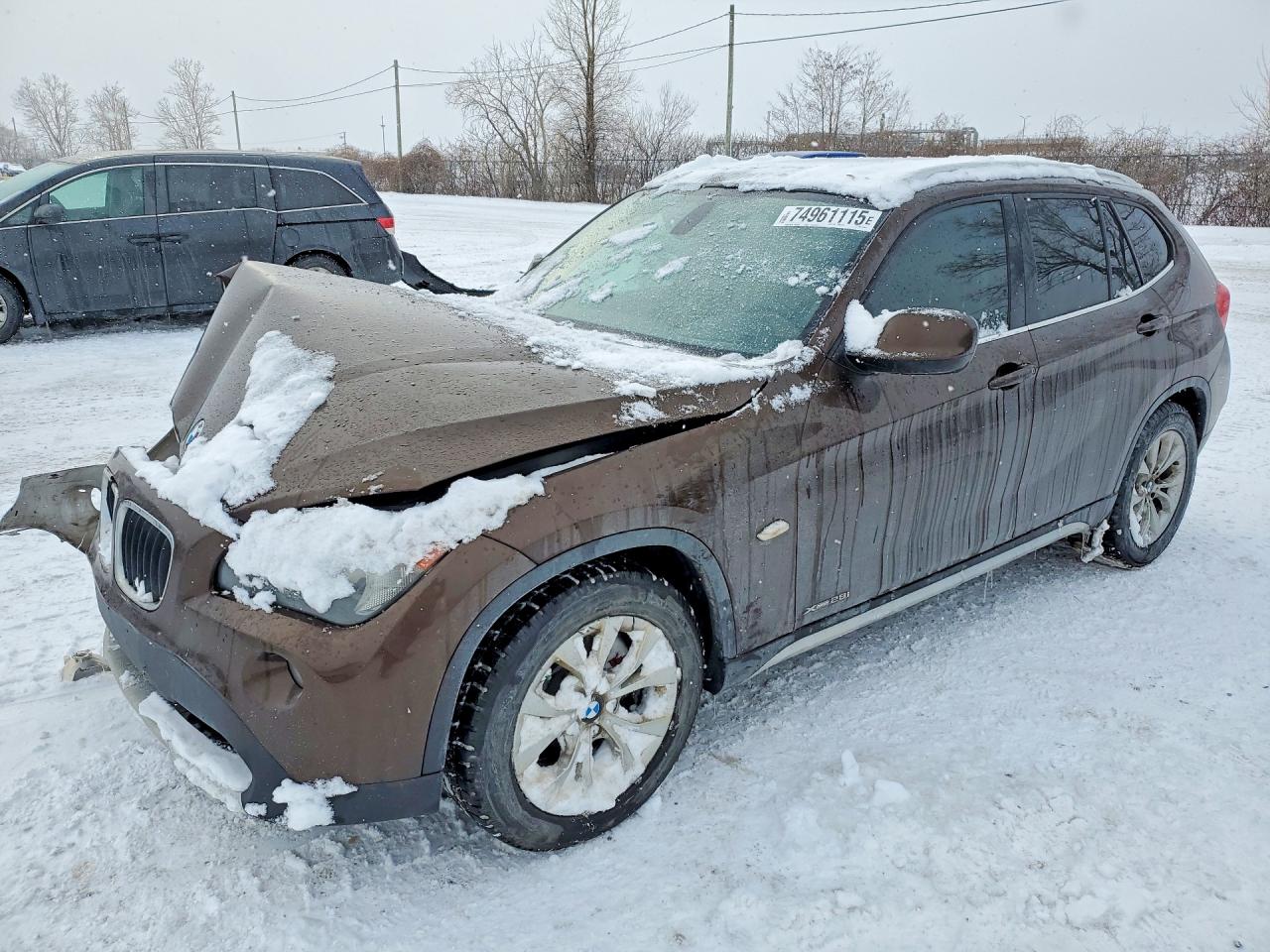 2012 BMW X1 28i, VIN WBAVL1C56CVR79019 — Front end