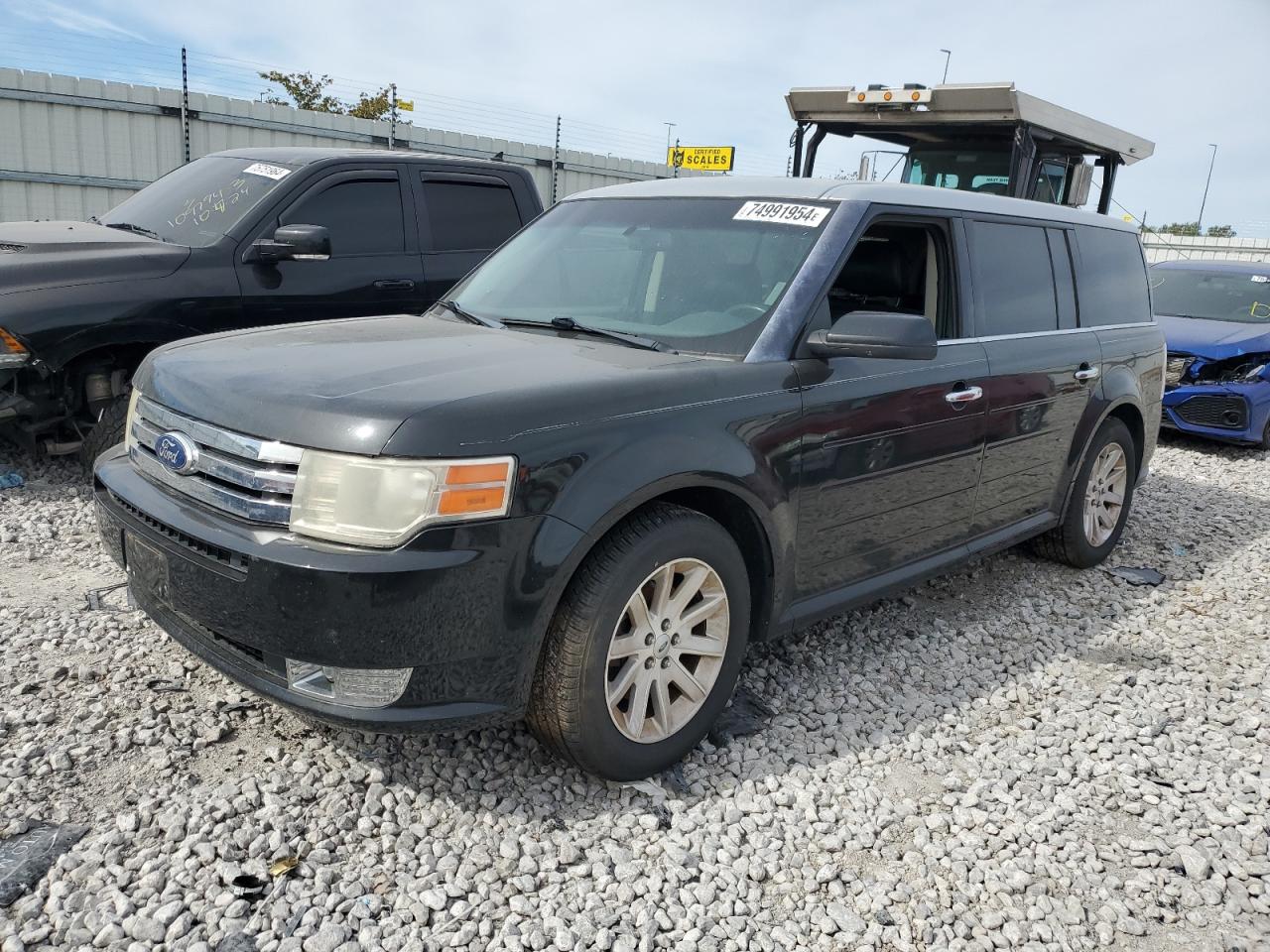 2011 Ford Flex SEL, VIN 2FMHK6CC3BBD20397 — Side