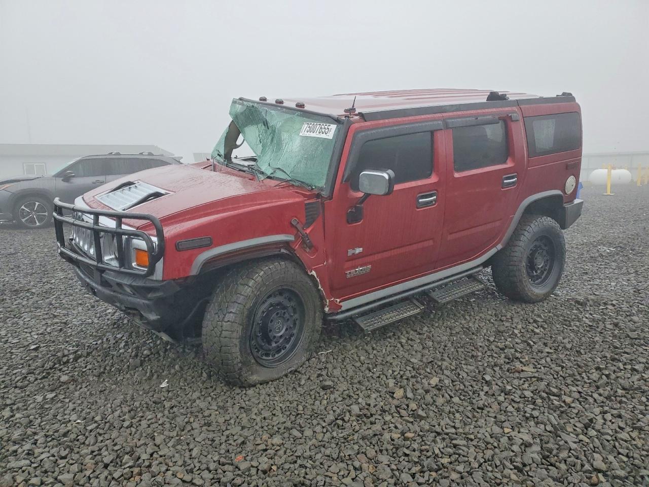 2003 Hummer H2, VIN 5GRGN23U23H129565 — Roof