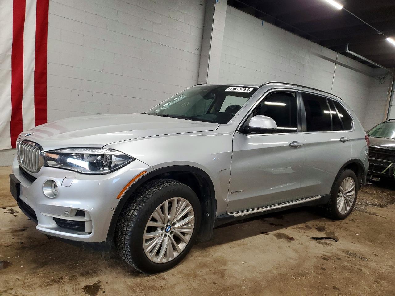 2015 BMW X5 xDrive50i, VIN 5UXKR6C55F0J74310 — Side