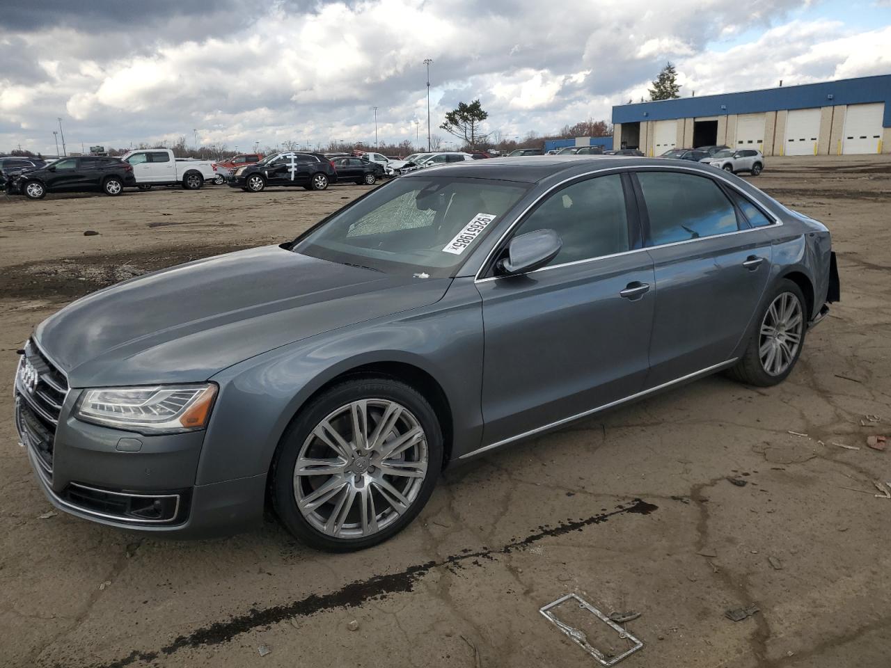 2016 Audi A8 3.0T, VIN WAU34AFD4GN015130 — Side